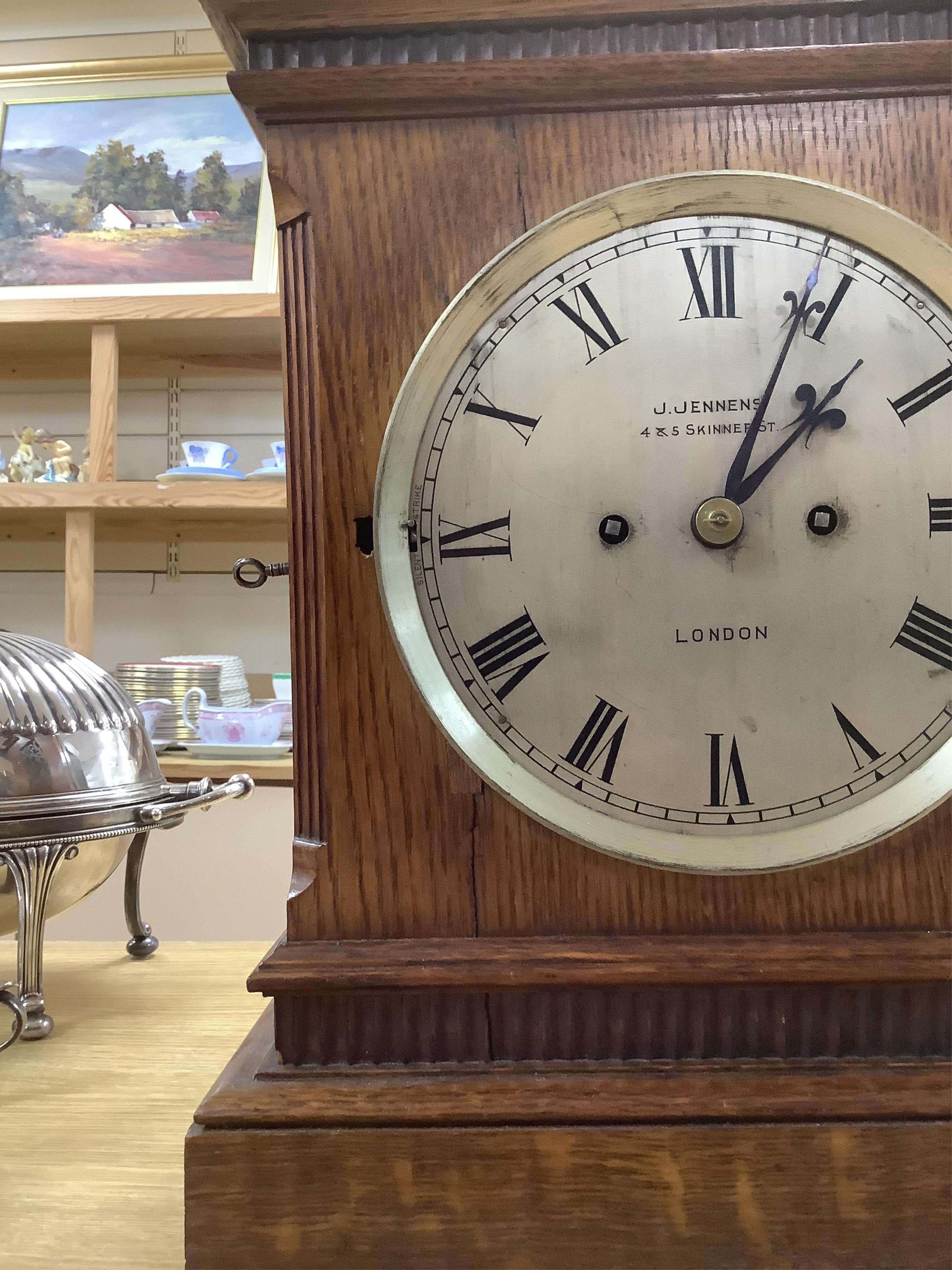 A mid 19th century oak eight day mantel clock, signed J. Jennens, Skinner St. London, pendulum, no key. 45cm. Condition - fair to good, a little faded in areas. Not tested as working